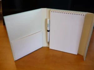 Estuche porta notas, interior con porta boli