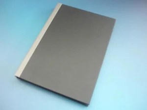 Lomo plano dos materiales en encuadernado dos-rapporté