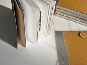 Cuadernos Photogune cosido grapa y disco de cierre